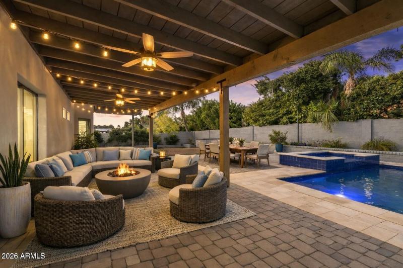 Twilight backyard retreat with fire pit