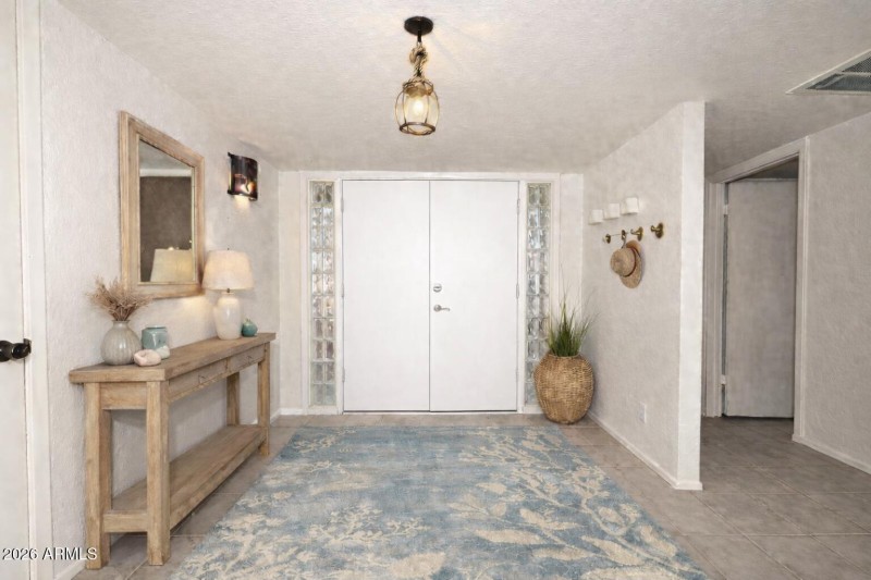 Elegant entryway with natural light