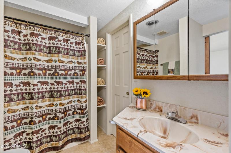 Primary Bathroo With His & Hers Closets