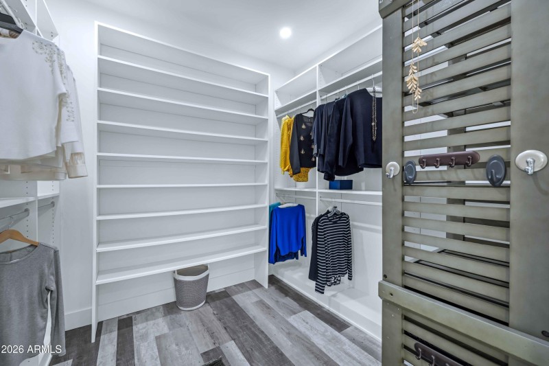 HER WALK-IN CLOSET
