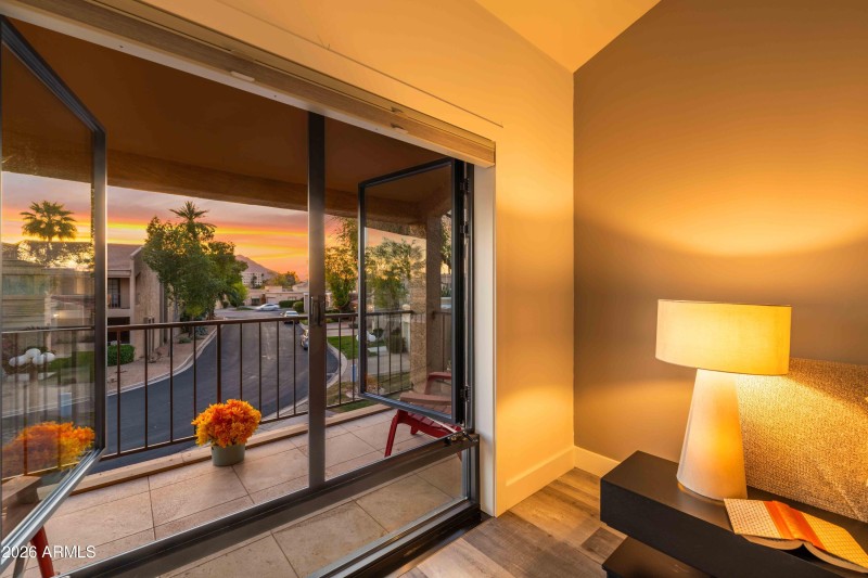 WINDOWS OPEN TO BALCONY