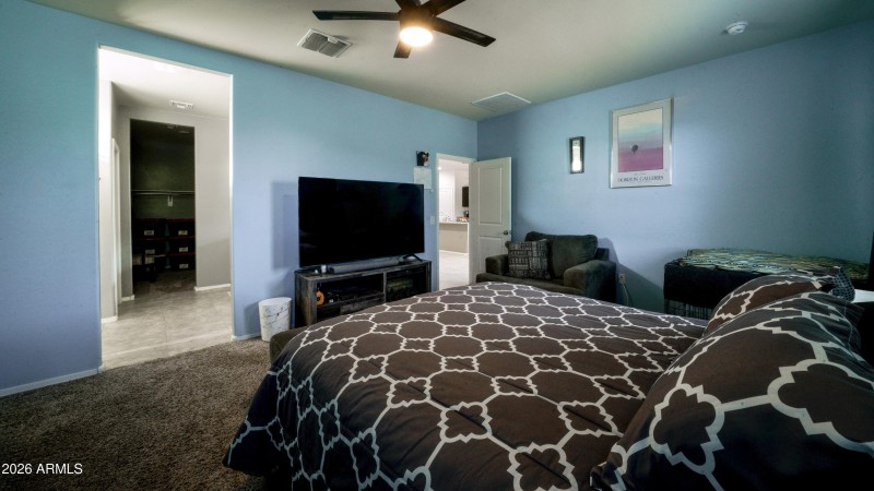 Master looks into bathroom