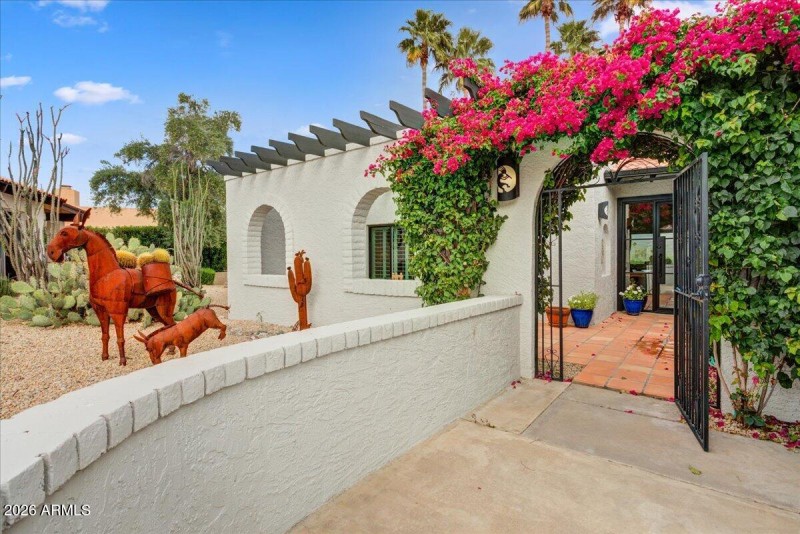 Stunning entry into charming courtyard