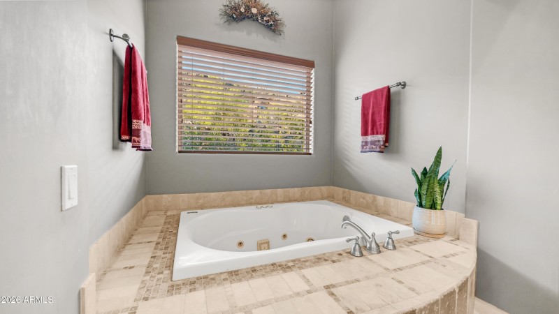 Jetted tub in jack and jill bath