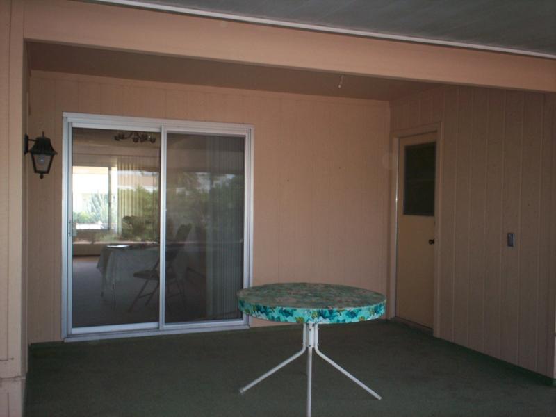 enclosed patio with sliding doors