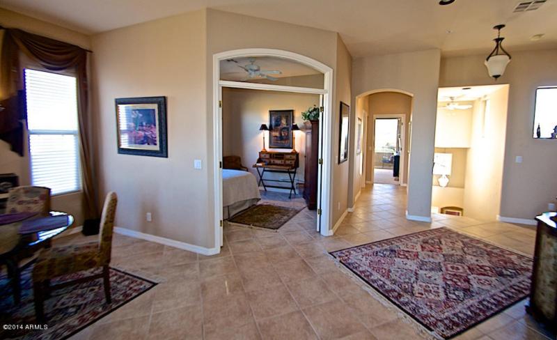 Greatroom into den with queen bed