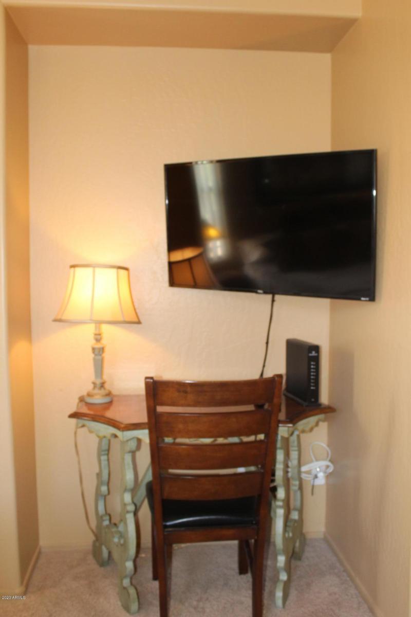 Bedroom with TV and Desk