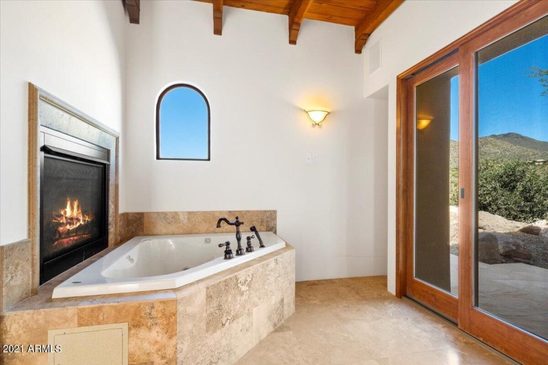 39-Primary Bathroom Tub _ Fireplace