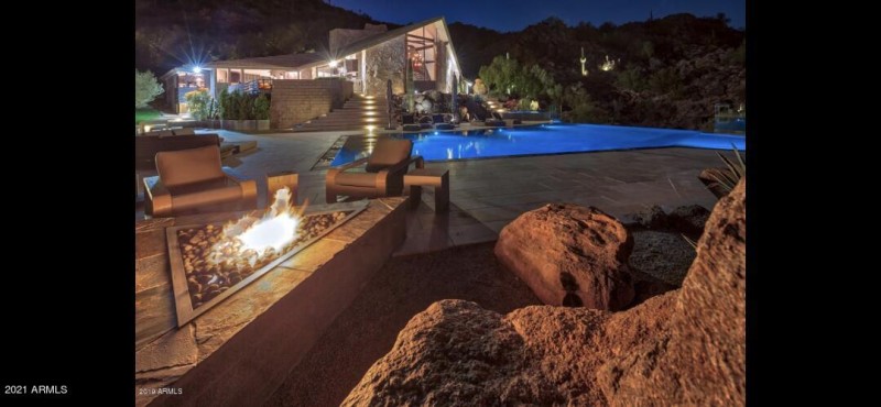 Pool and house view at night