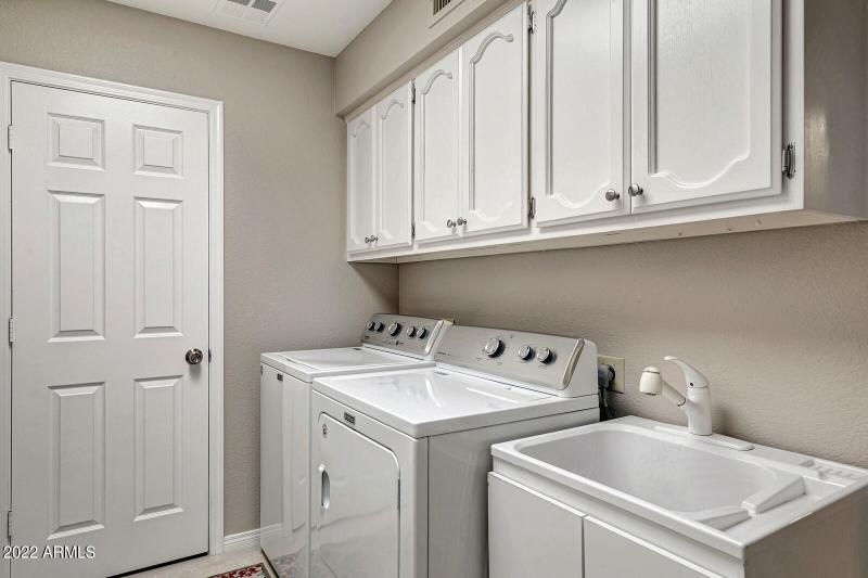 Laundry Room with Cabinets and Sink