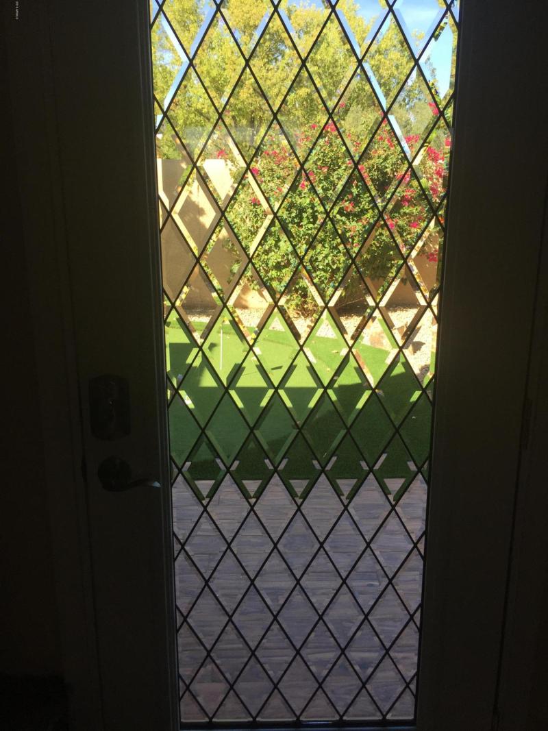 LOOKING AT PUTTING GREEN