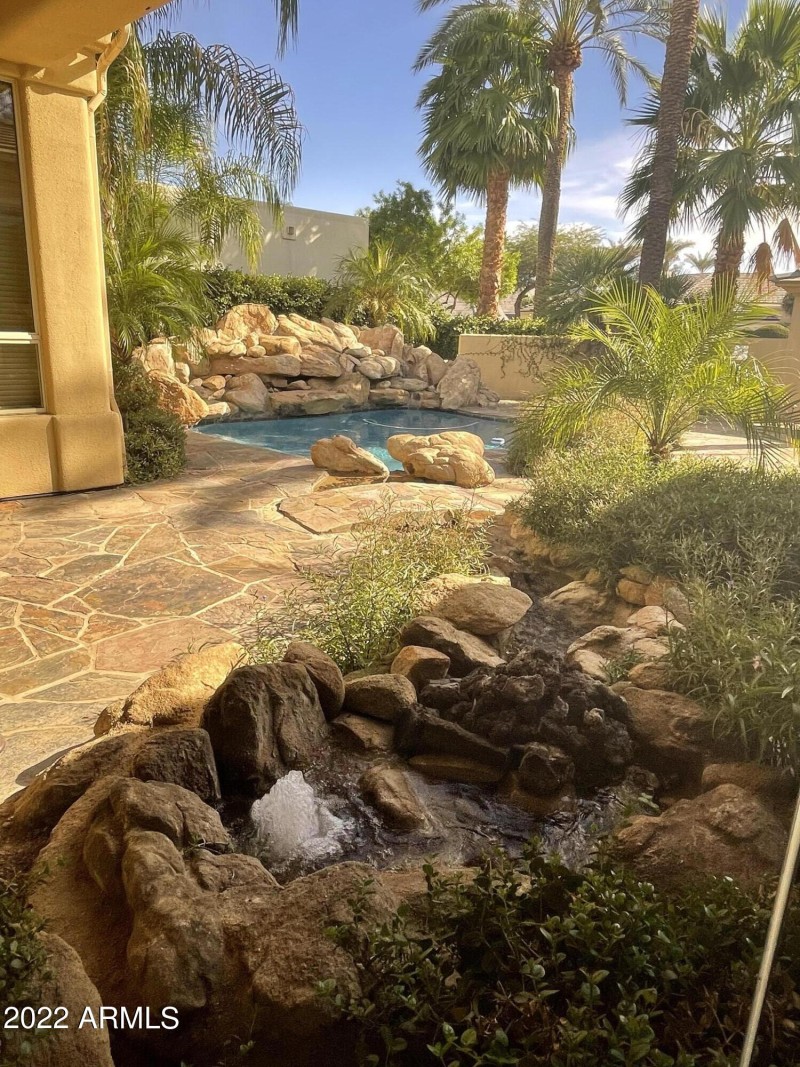 FIREPIT AND CREEK INTO POOL