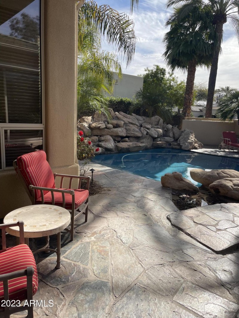 CREEK RUNS INTO POOL