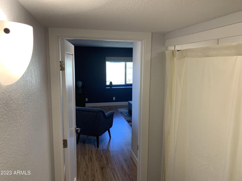 Hallway to private Primary BR