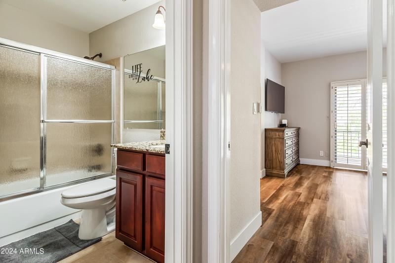 SECONDARY BATHRM + VIEW TO PRIMARY BDRM