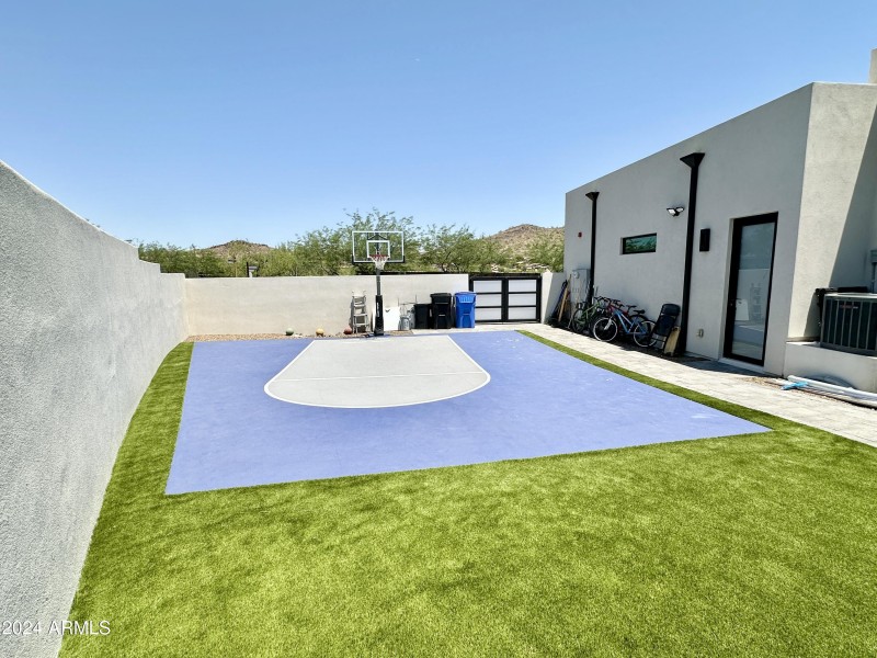 Sports court and door toward garage