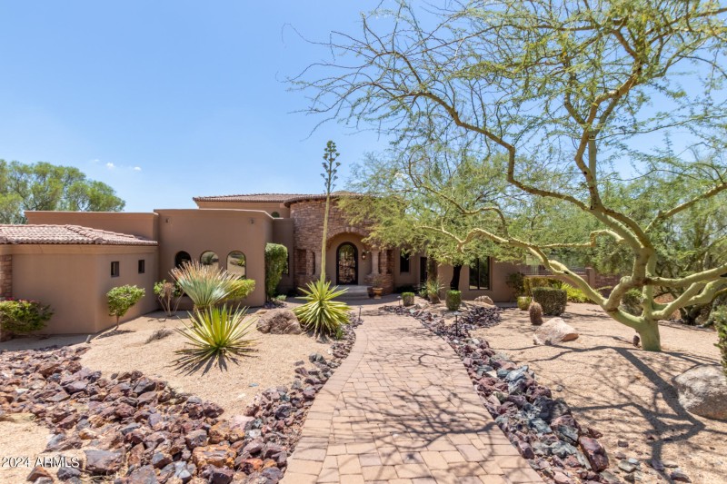 Tranquil Entry Through Desert Garden