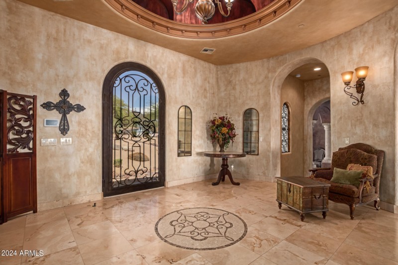 Grand Foyer with Iron Accents
