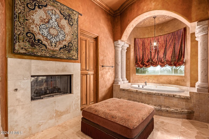 Spa Bath with Fireplace Accent