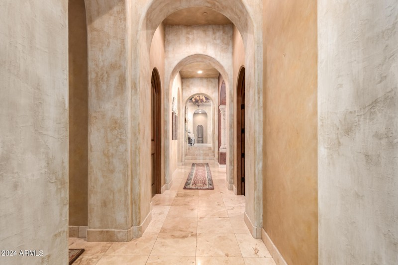 Arch-Lined Hallway with Drama