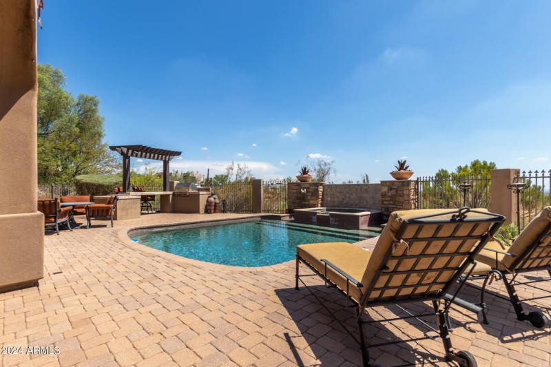 Sparkling Pool with Desert Views