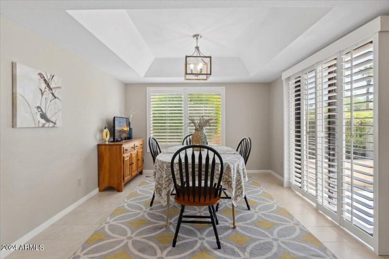 Dining with patio view and tv