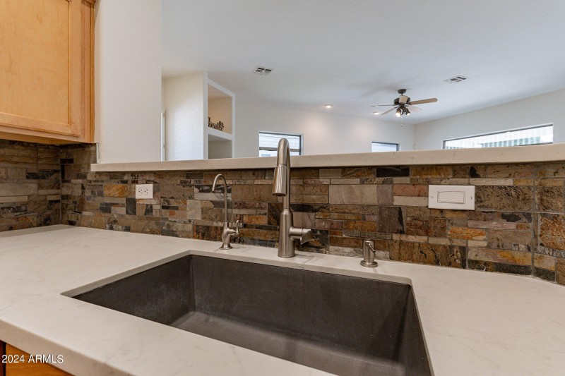 Gorgeous backsplash and sink