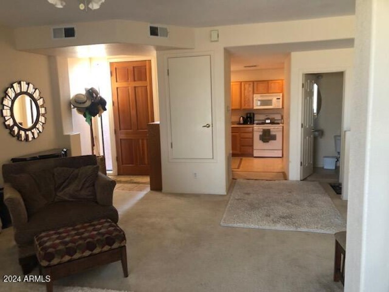 LIVING ROOM LOOKING INTO KITCHEN