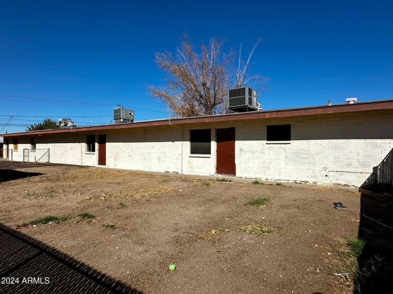 LEFT YARD FACING BUILDING SIDE
