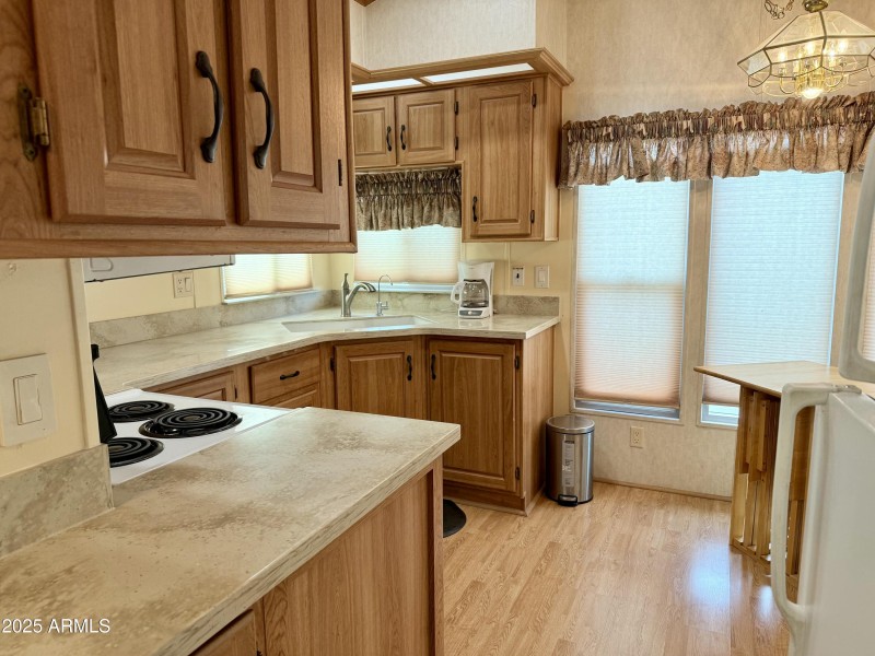 7750 E. Broadway Rd. #232