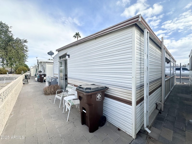 SIDE VIEW OF SHED/BACK PATIO