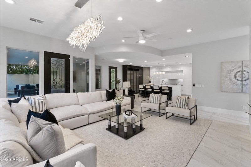 Living area next to gourmet kitchen