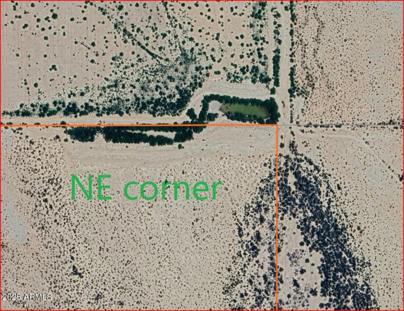 Water holding pond above NE corner
