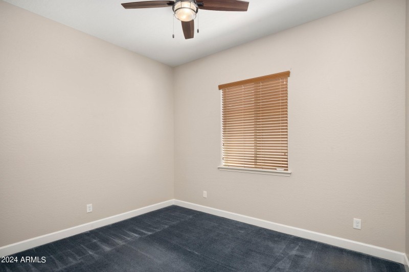Versatile Bedroom with Fan