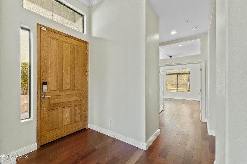 Front door with view of Bedroom 1