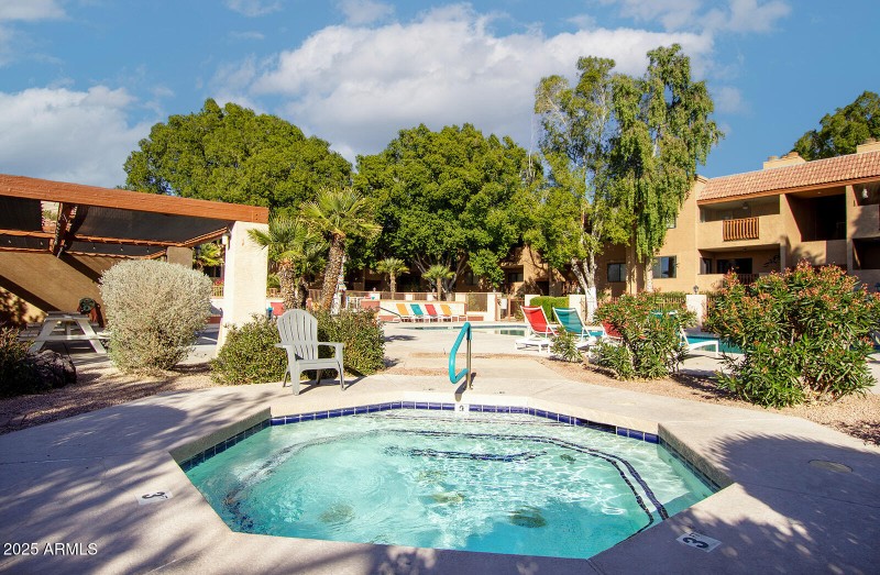 Hot tub steps from your unit