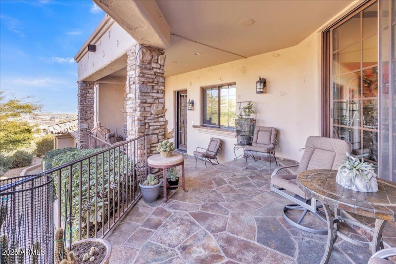 Side covered patio off of the kitchen