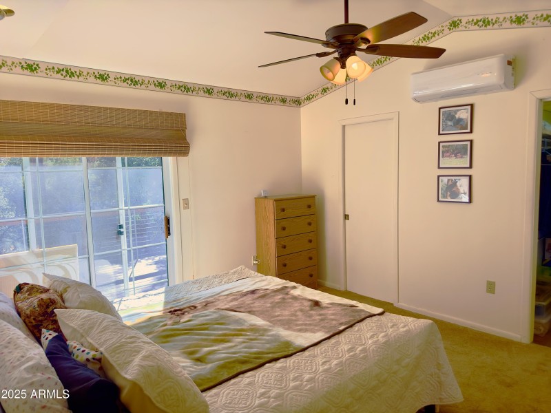 PRIMARY BEDROOM WITH PRIVATE DECK