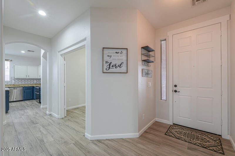 Hall view towards den & kitchen