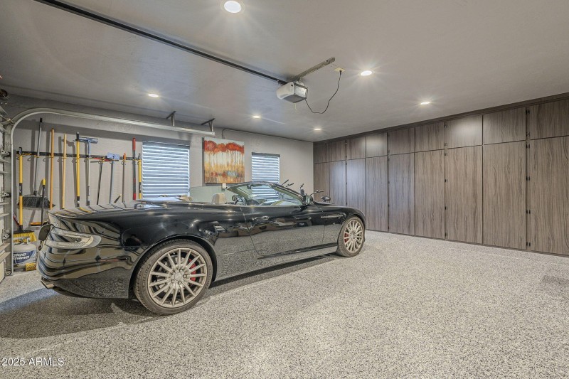 2 car garage with built in cabinets