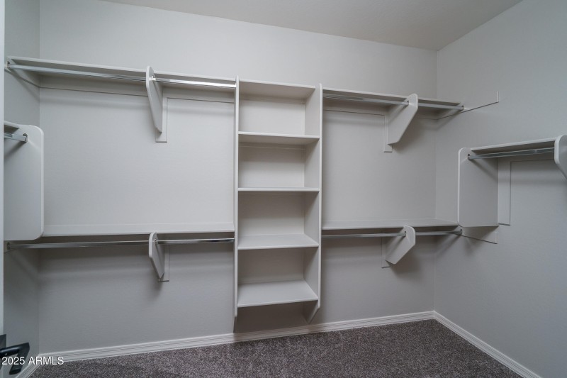16) PRIMARY CLOSET
