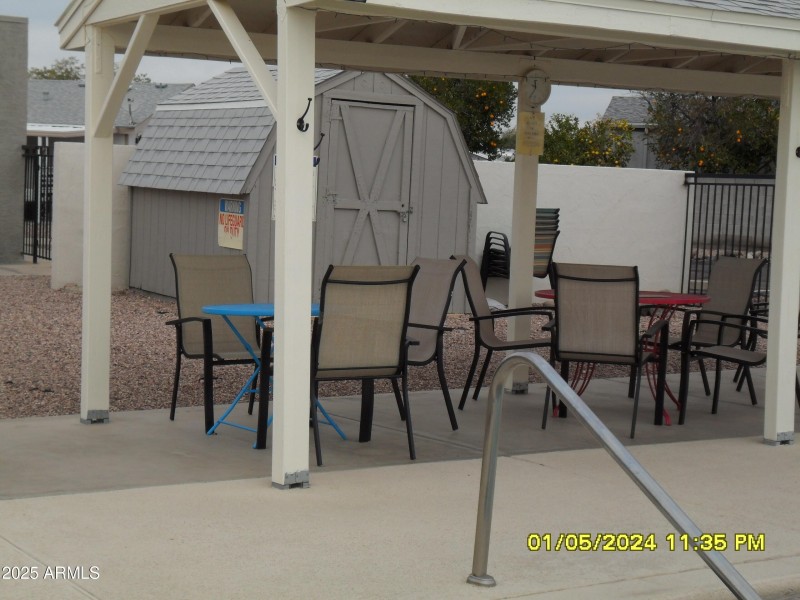 pool area under gazebo-shed