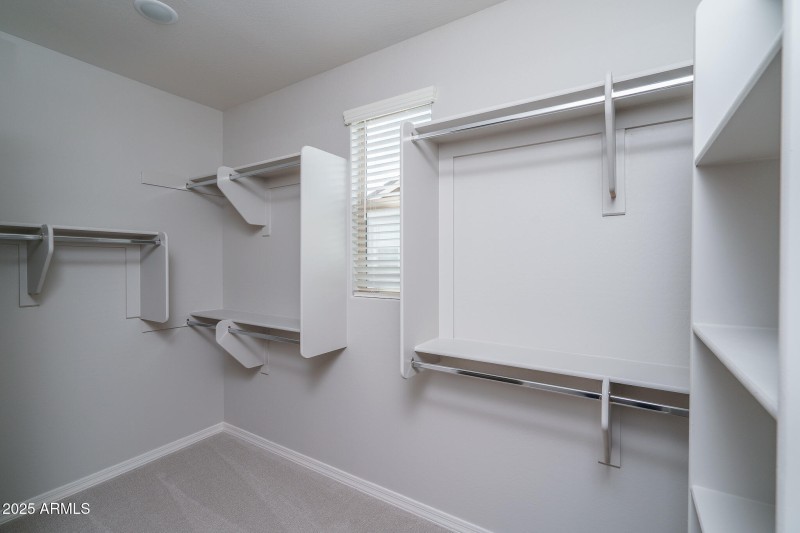 15) PRIMARY CLOSET