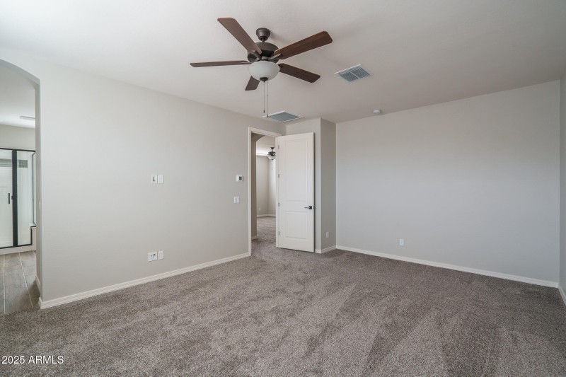 12) PRIMARY BEDROOM