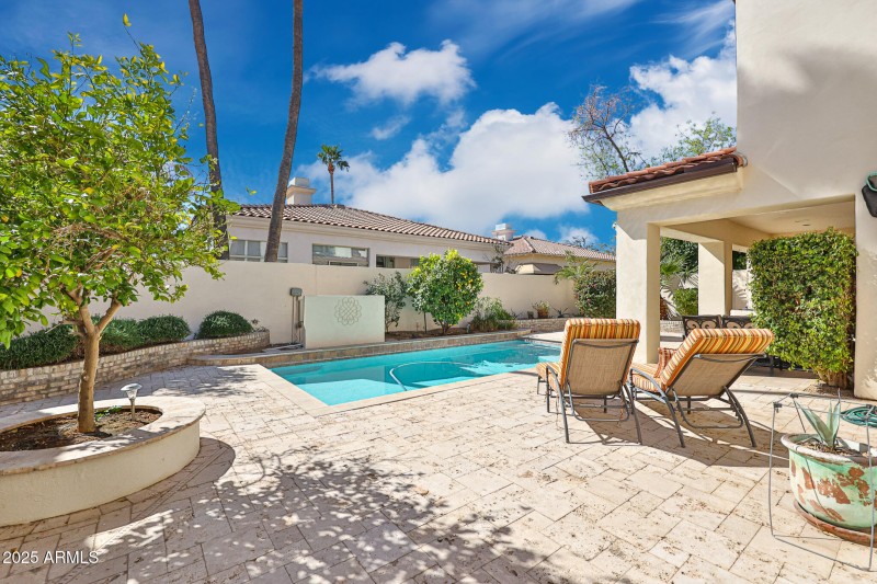 Travertine in Oasis-Like Backyard