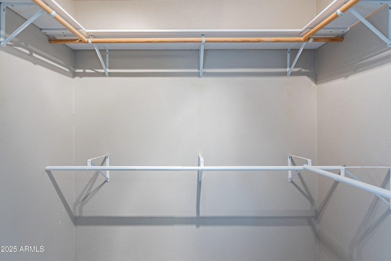 Walk-in closet in primary suite