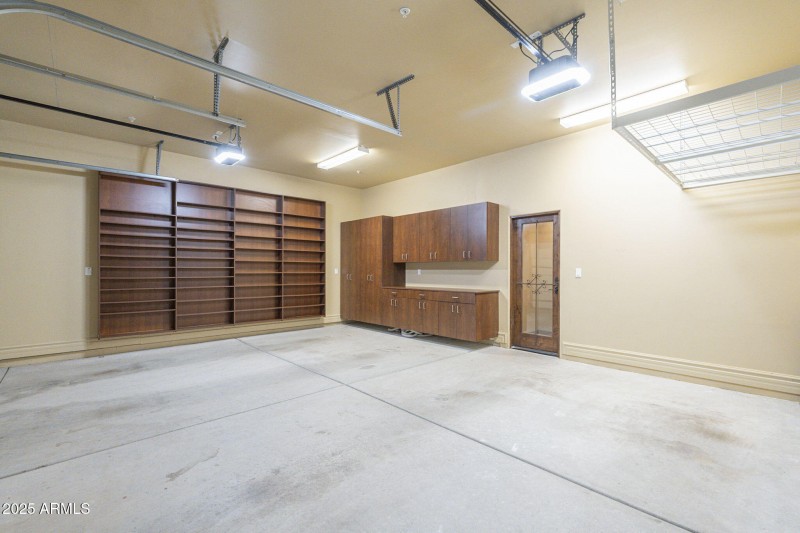 Garage with built in shelving and door t