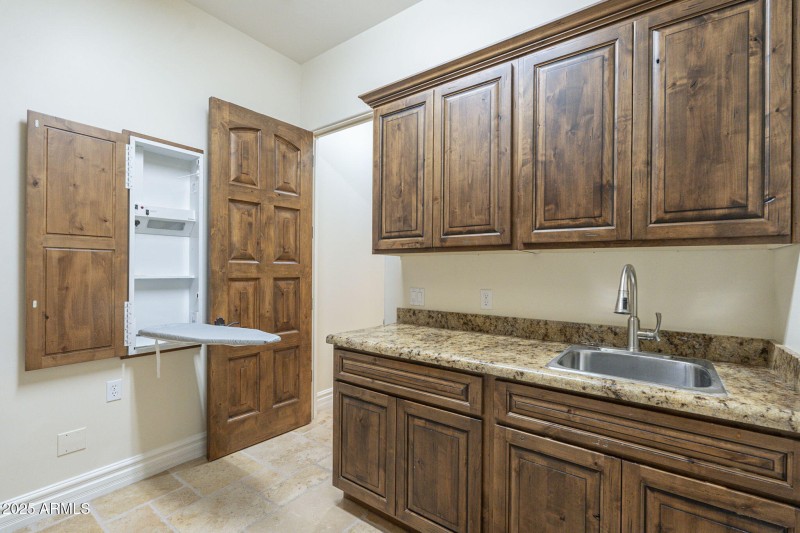 Laundry room built in ironing center