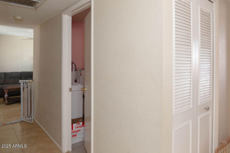 2 Storage Closets in the Hallway