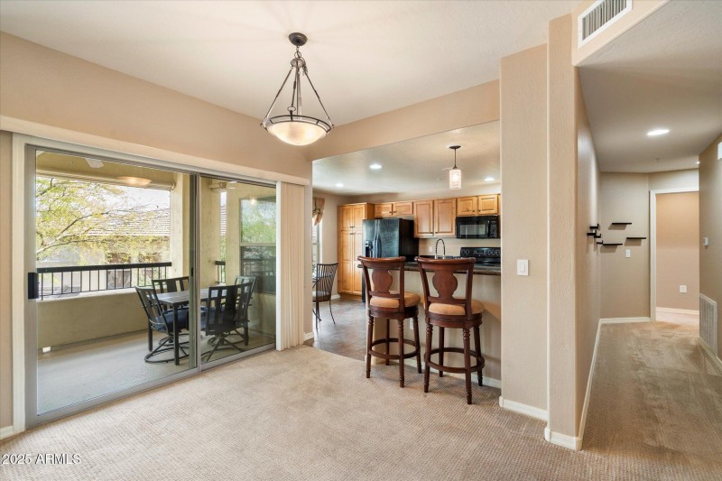 breakfast bar with patio entrance